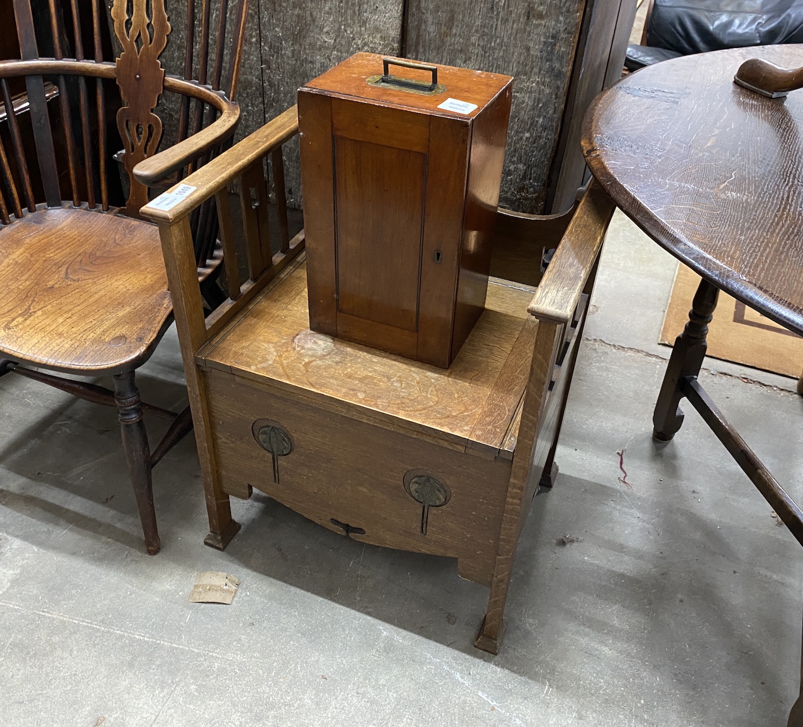 An Art Nouveau oak commode together with a Victorian mahogany microscope case and a wall cabinet